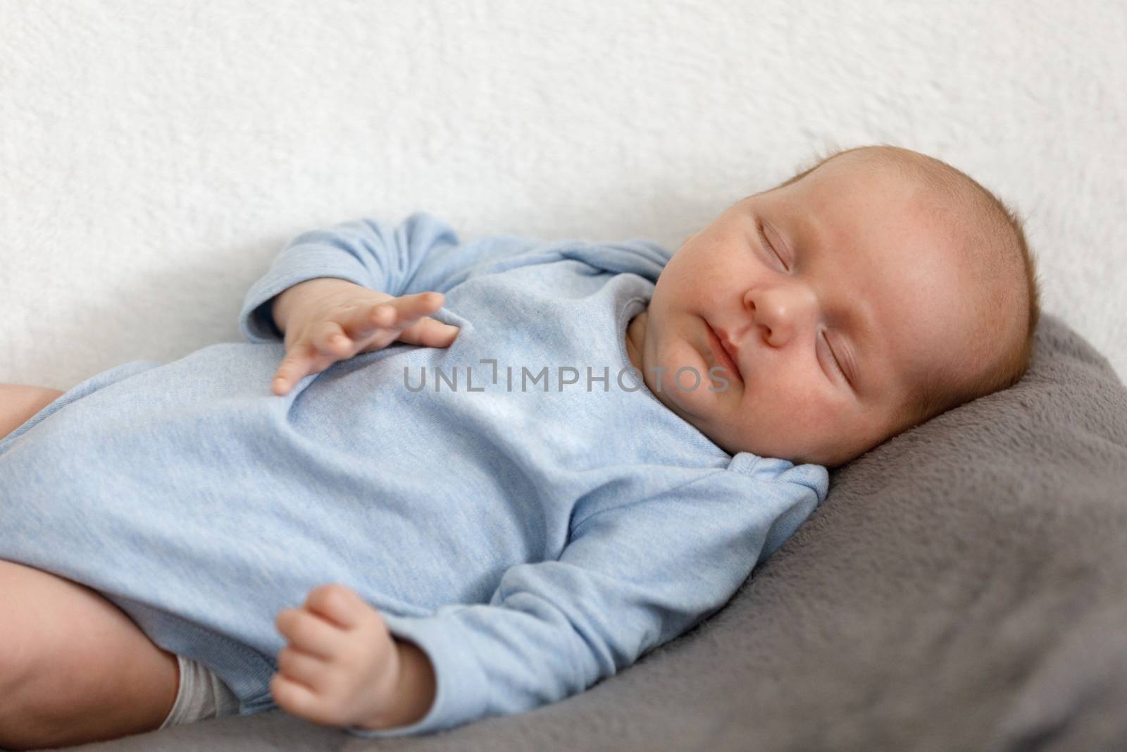 sleeping newborn baby by artush