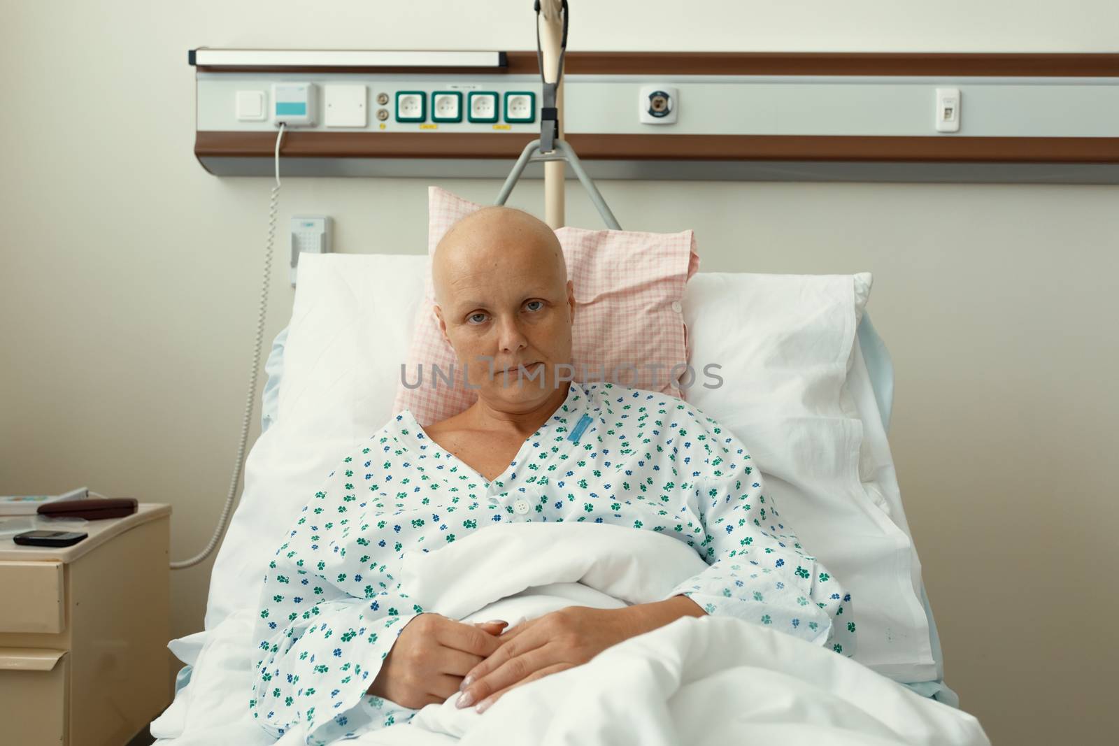woman patient with cancer in hospital by artush