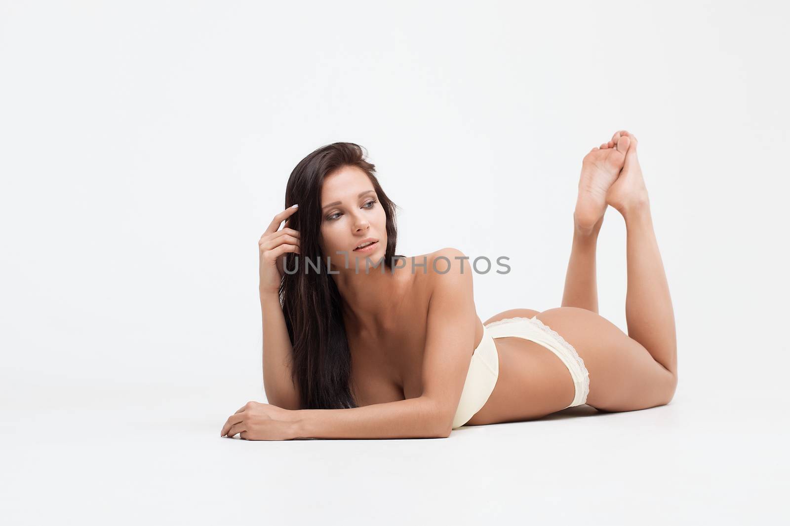 Sexy woman on white background. Perfect womans body.