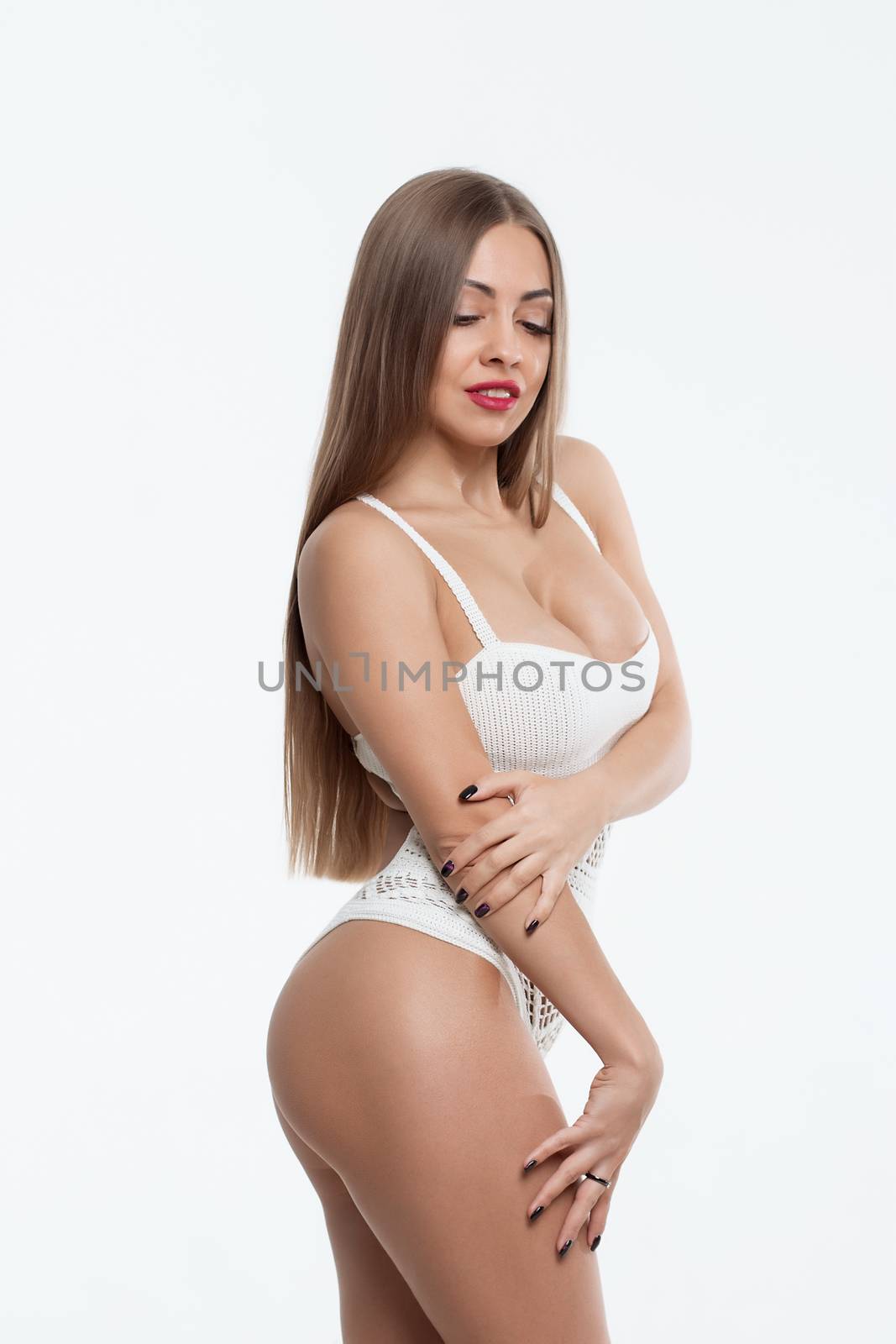 Sexy woman on white background. Perfect womans body.