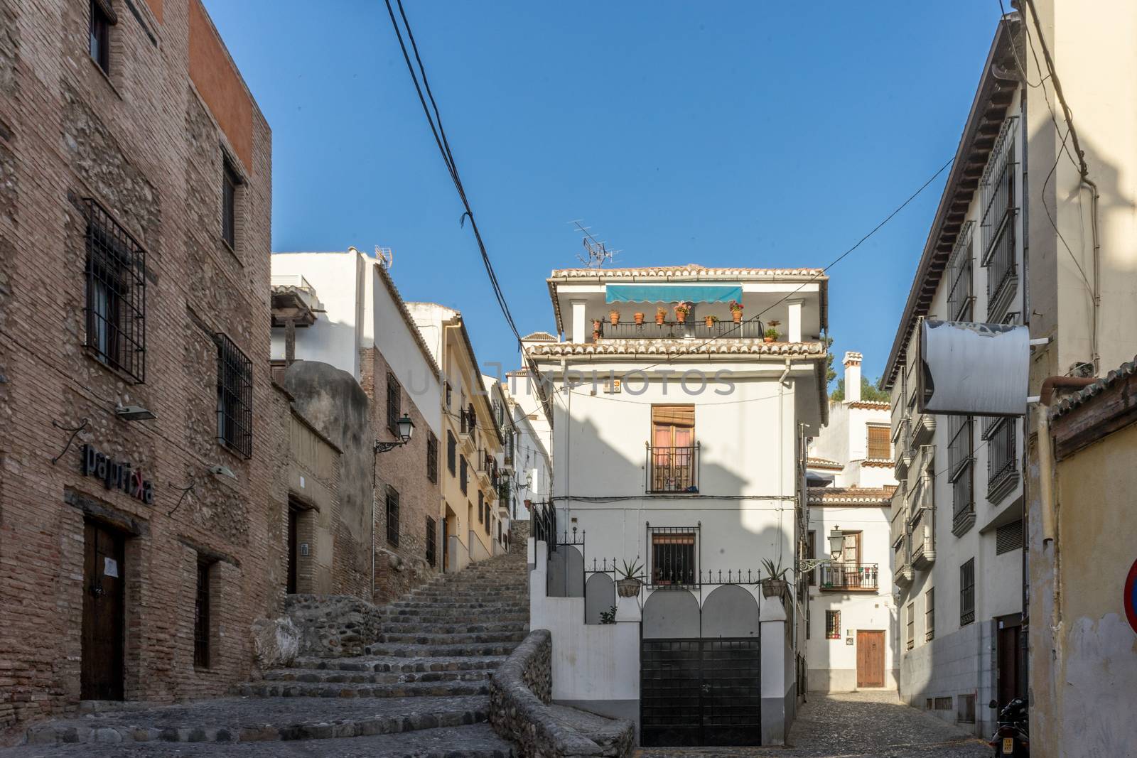 city center of Granada, Spain, Europe during golden hour of sunset on a bright sunny day