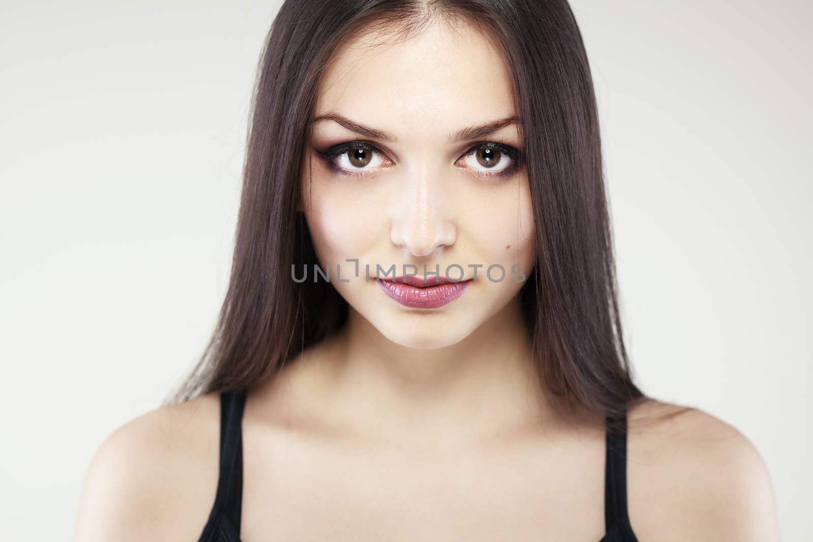 portrait of young girl with long brunette hair