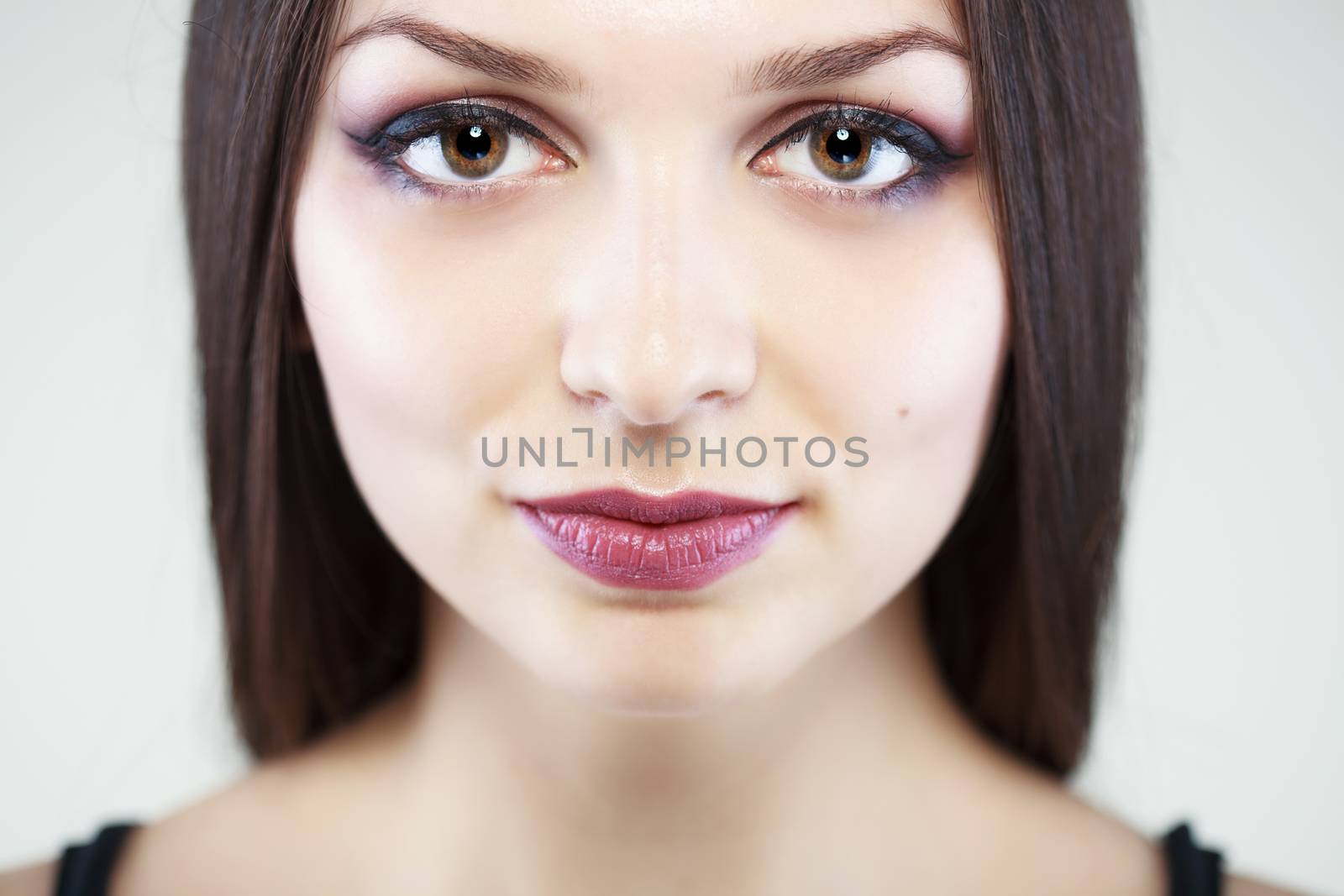 portrait of young girl with long brunette hair