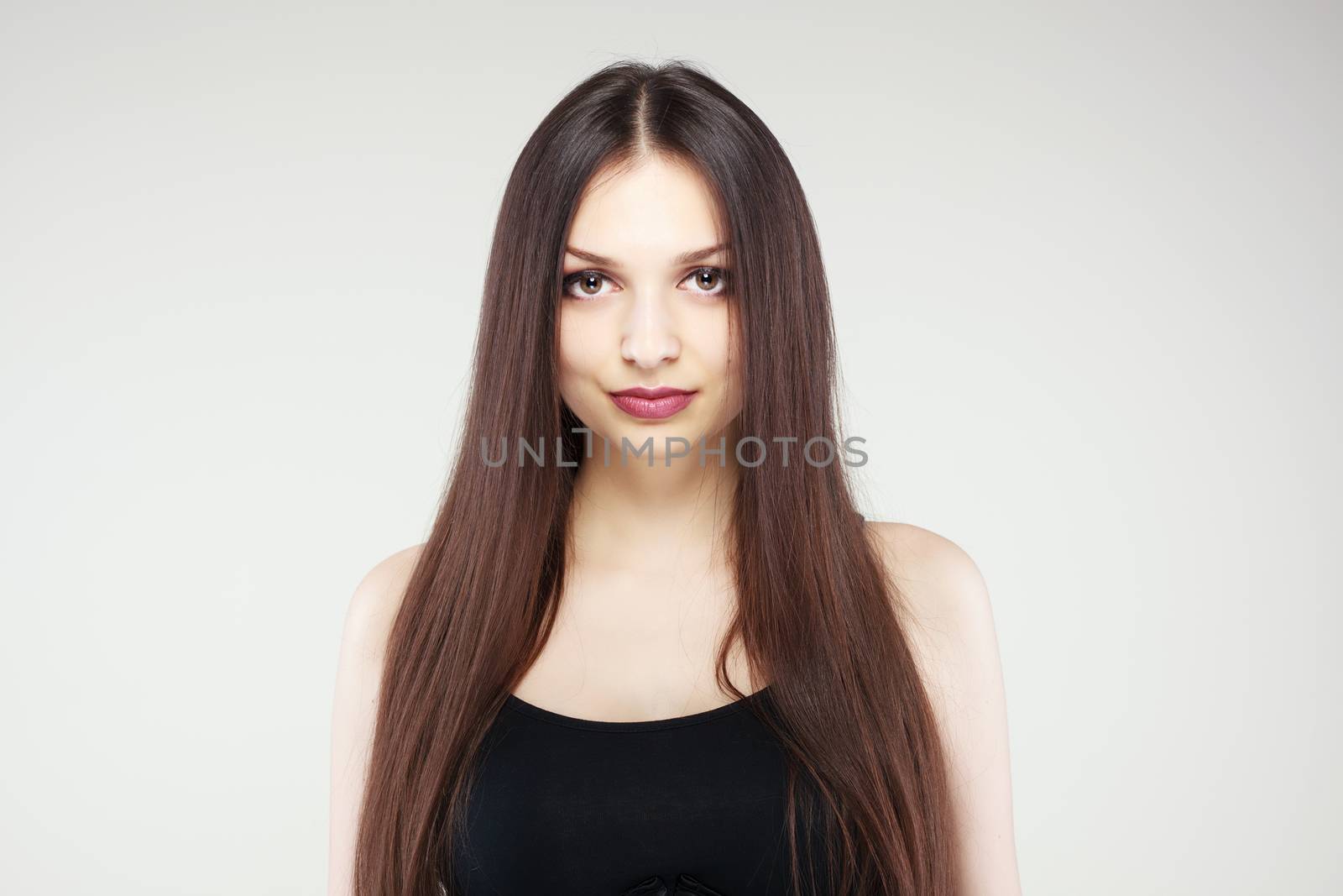 portrait of young girl with long brunette hair