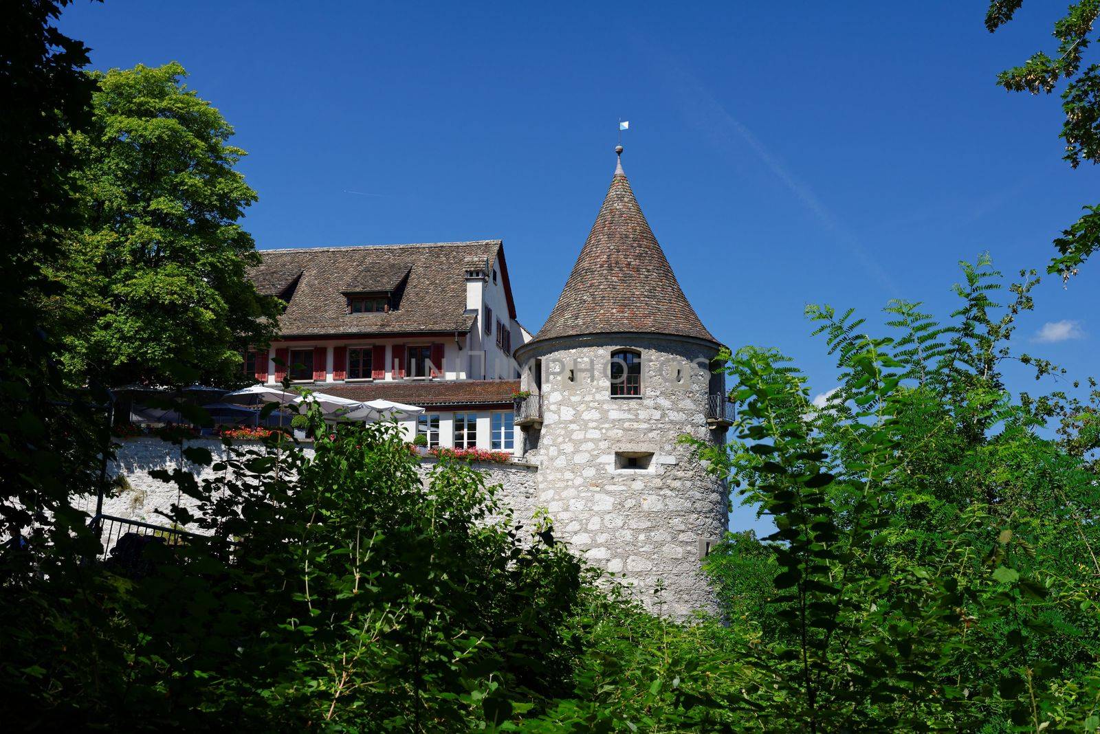 Tower and roof of Medieval Laufen castle in Switzerland