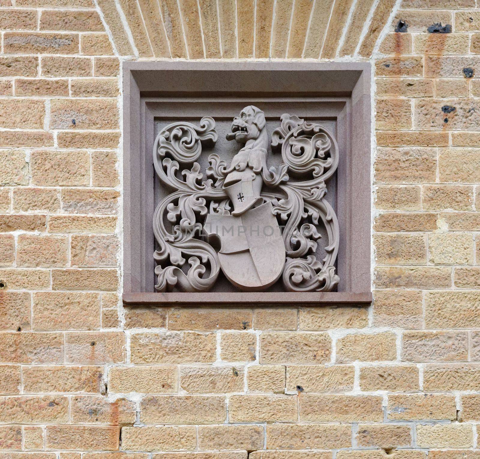 Coat of arms on the wall of Hohenzollern Castle in Germany by slavapolo