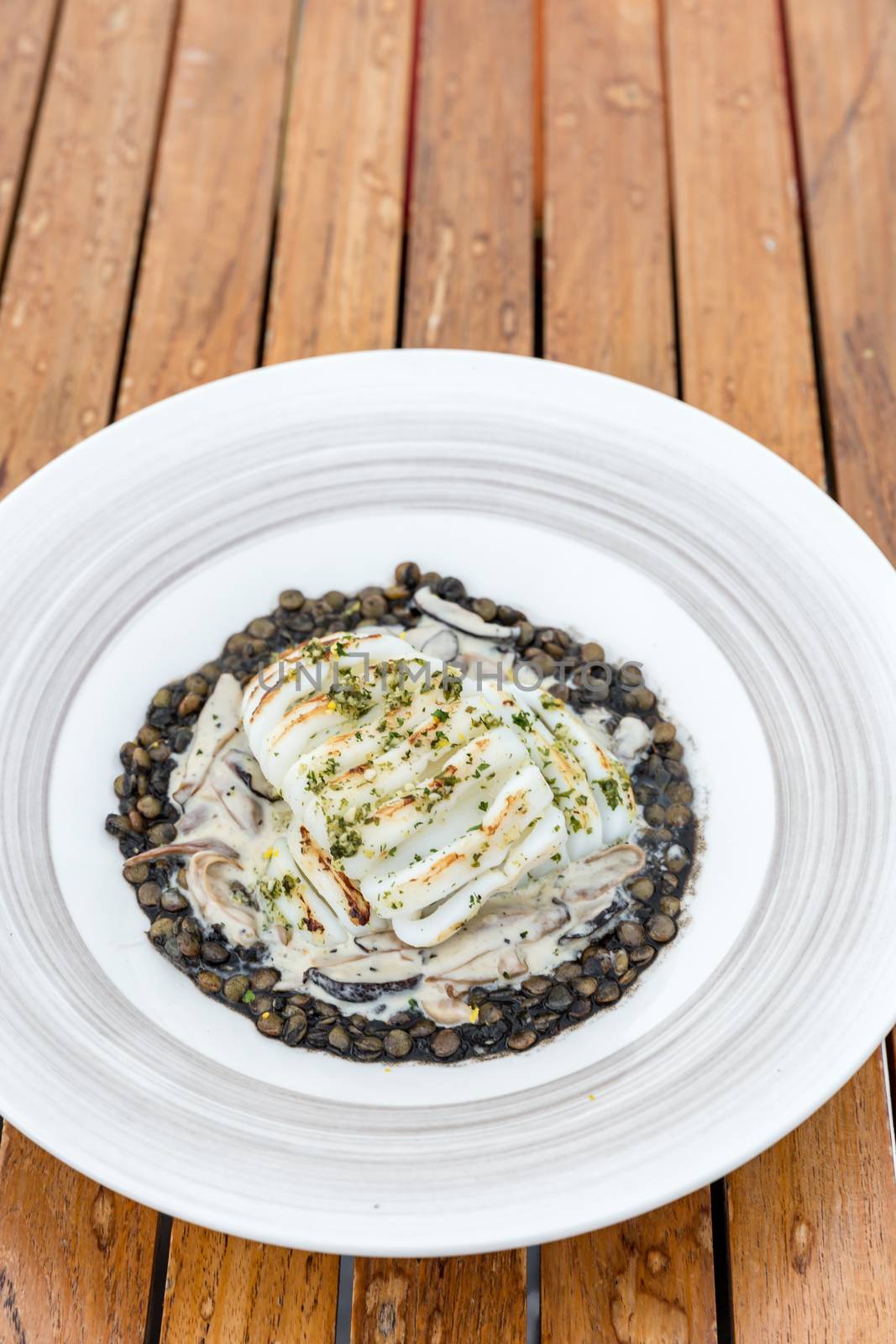 grilled squids with lentils nut mediterranean food cuisine