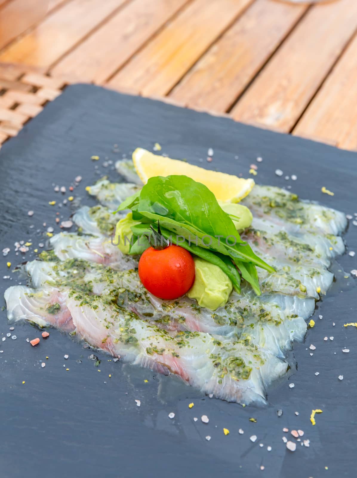 Sea bass sashimi mediterranean style cuisine