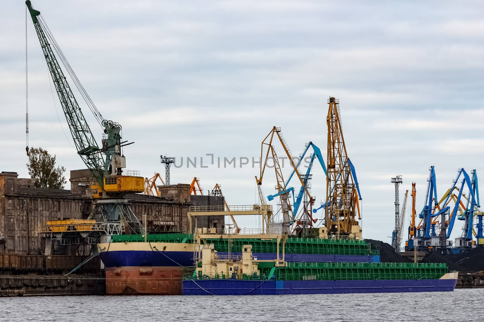Blue cargo ship in the port of Riga, Europe