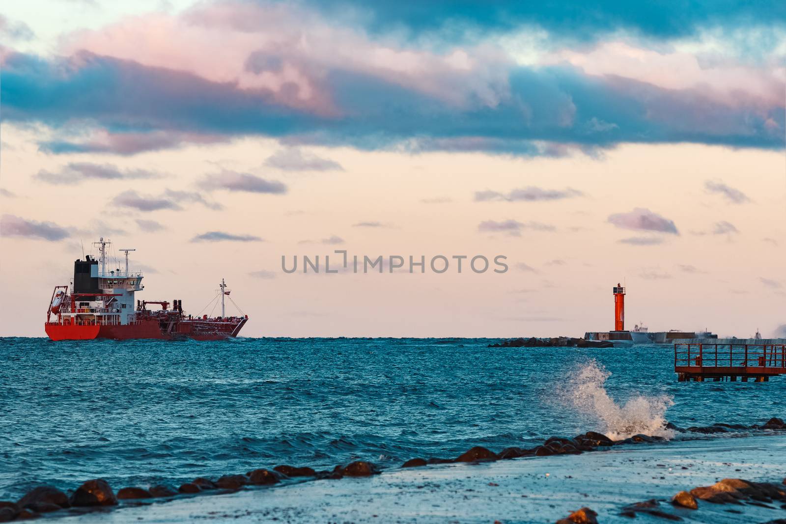 Red cargo oil tanker moving to Baltic sea