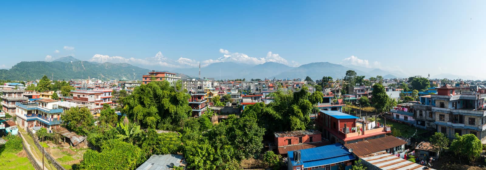 Panoramic view of Pokhara in Nepal. The Machapuchare and the Annapurna range in the background.