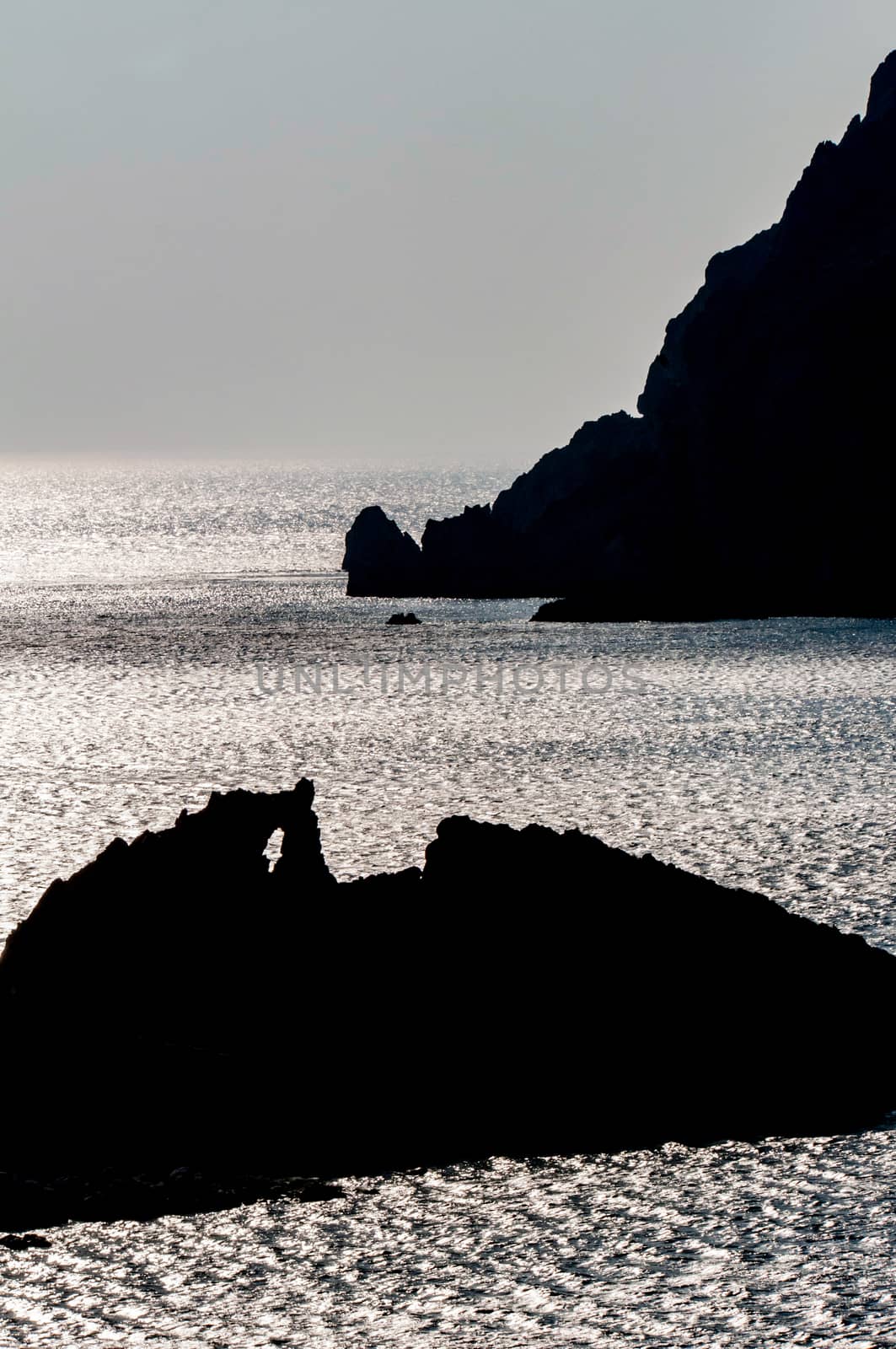 rocky silhouette in sea of patmos island