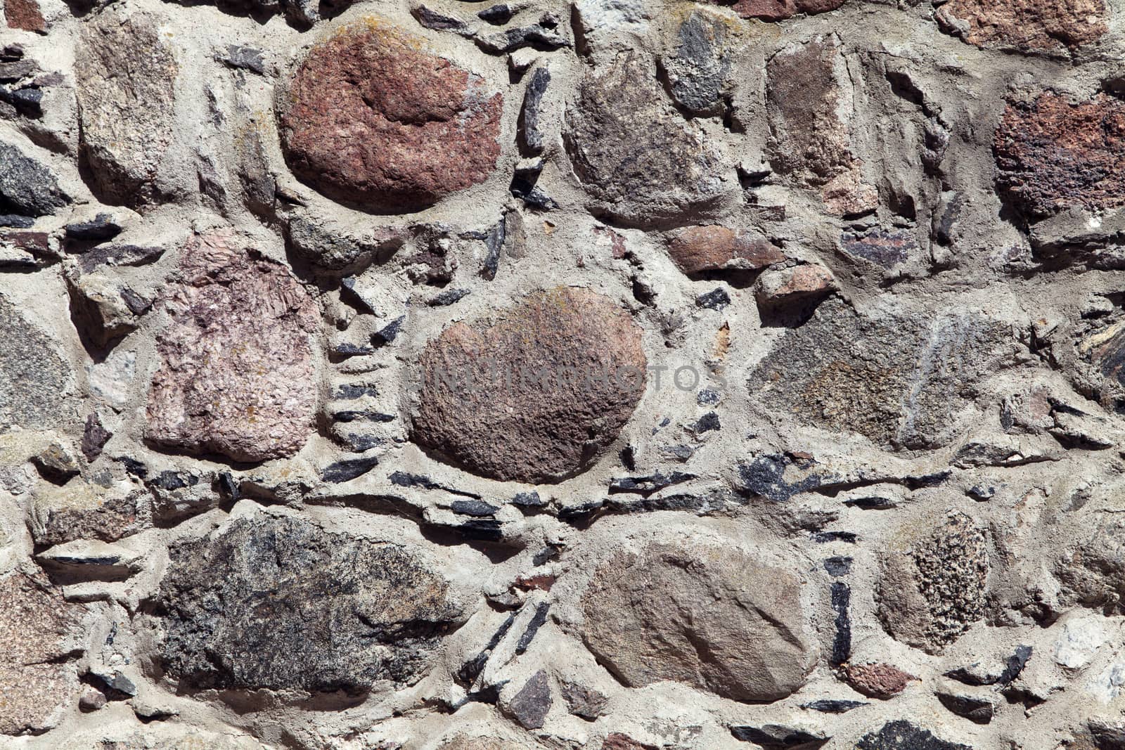 Old weathered stone wall for background or texture