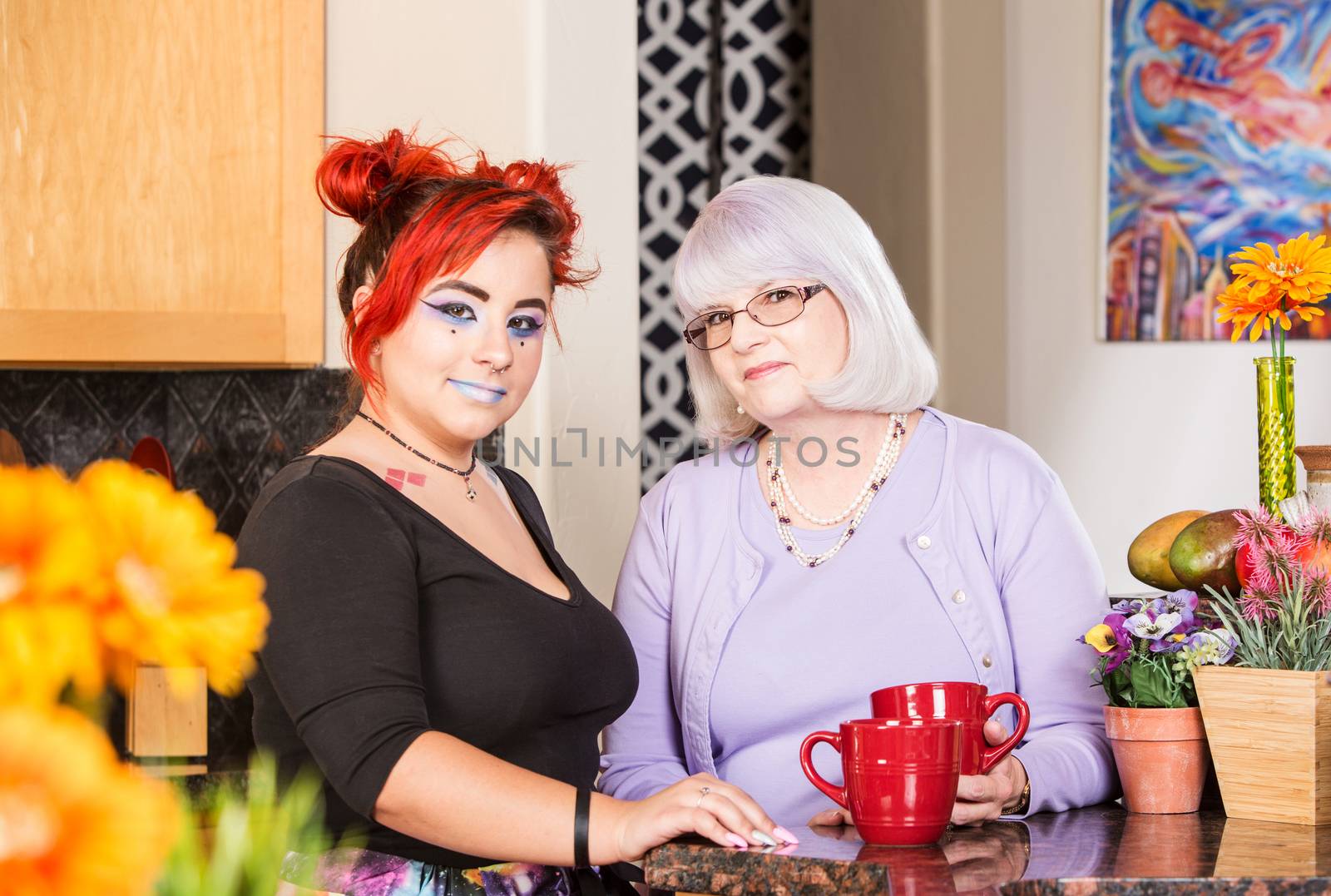 Mother and daughter stand in kitchen