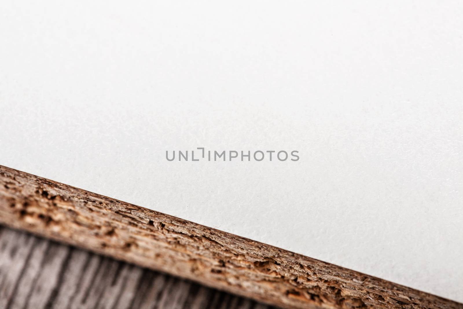 close-up of a straight cut white wooden board for furniture use