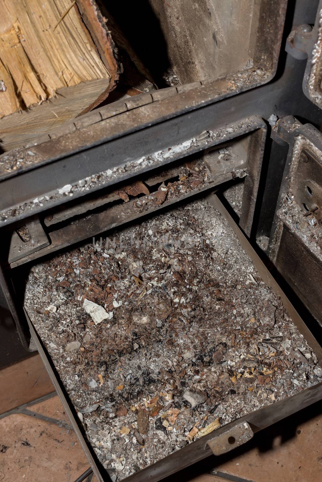 A box full of ashes under the fireplace