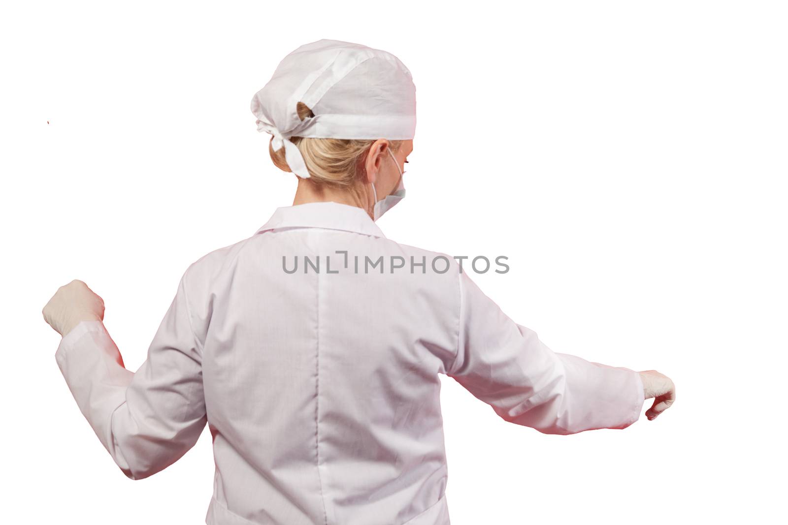 A female doctor or nurse with her back to the camera. Isolated with work path.