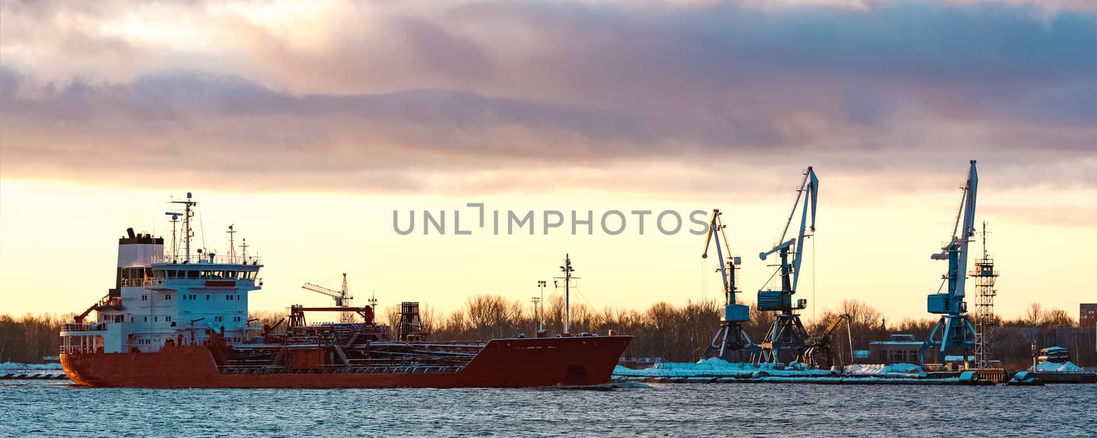 Red cargo oil tanker moving to Baltic sea