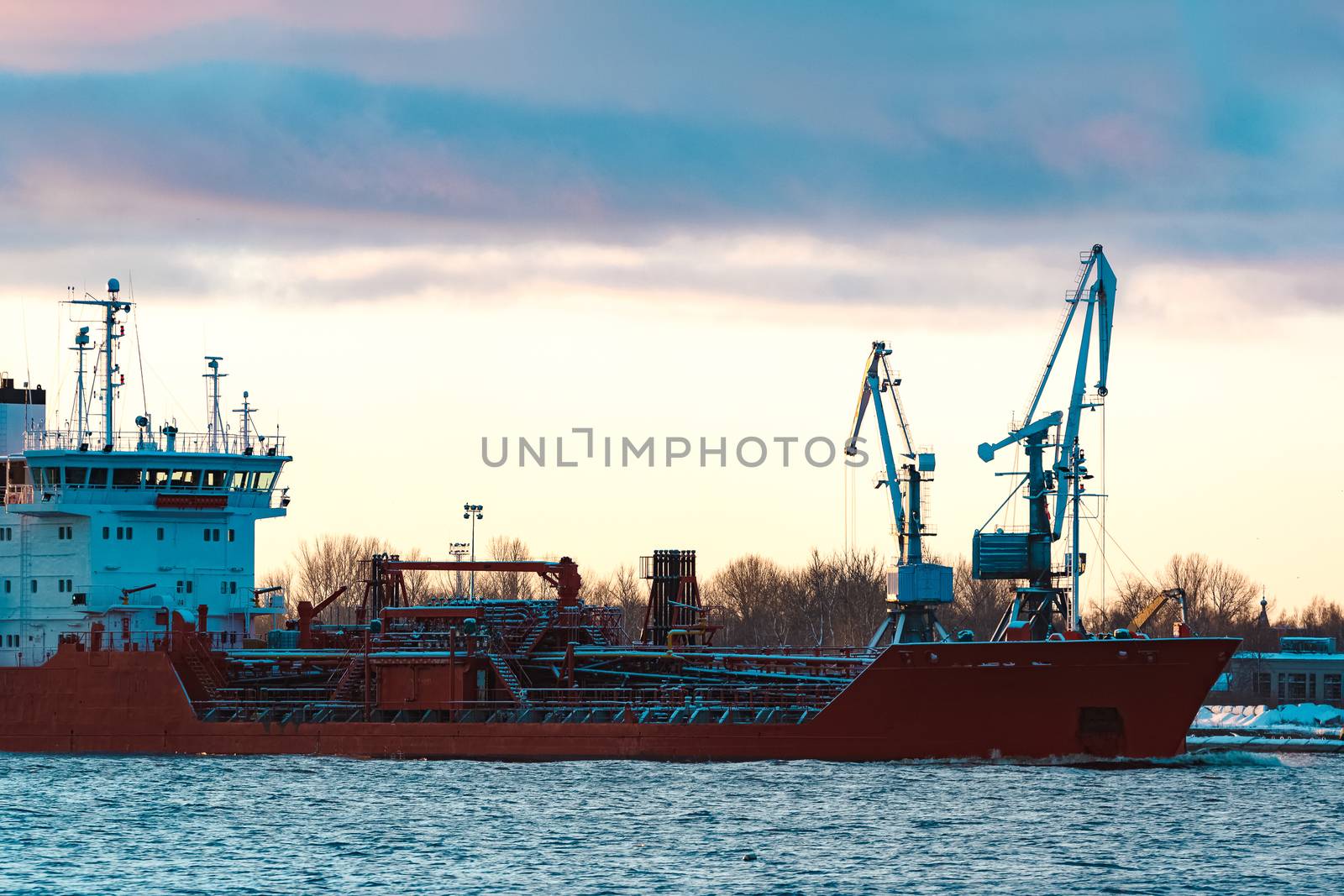 Red cargo oil tanker moving to Baltic sea