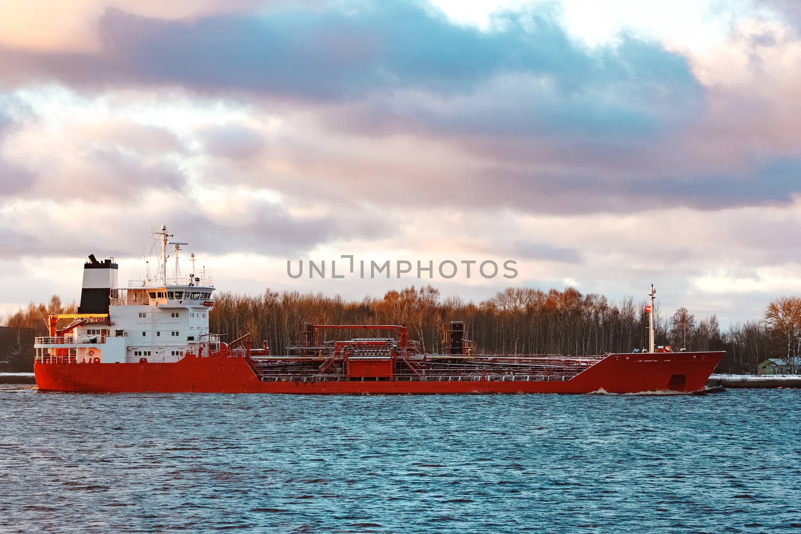 Red cargo oil tanker moving to Baltic sea