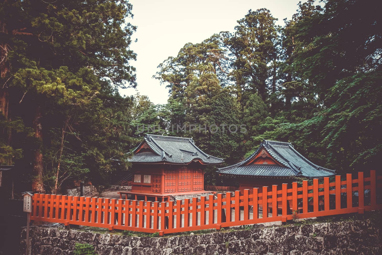 Traditional red wooden Shrine in Nikko, Japan