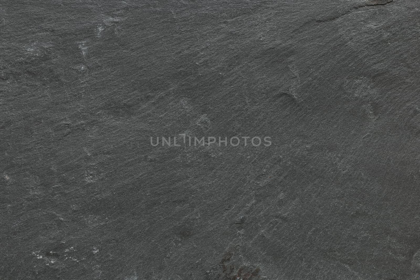 Dark grey black slate background or texture.