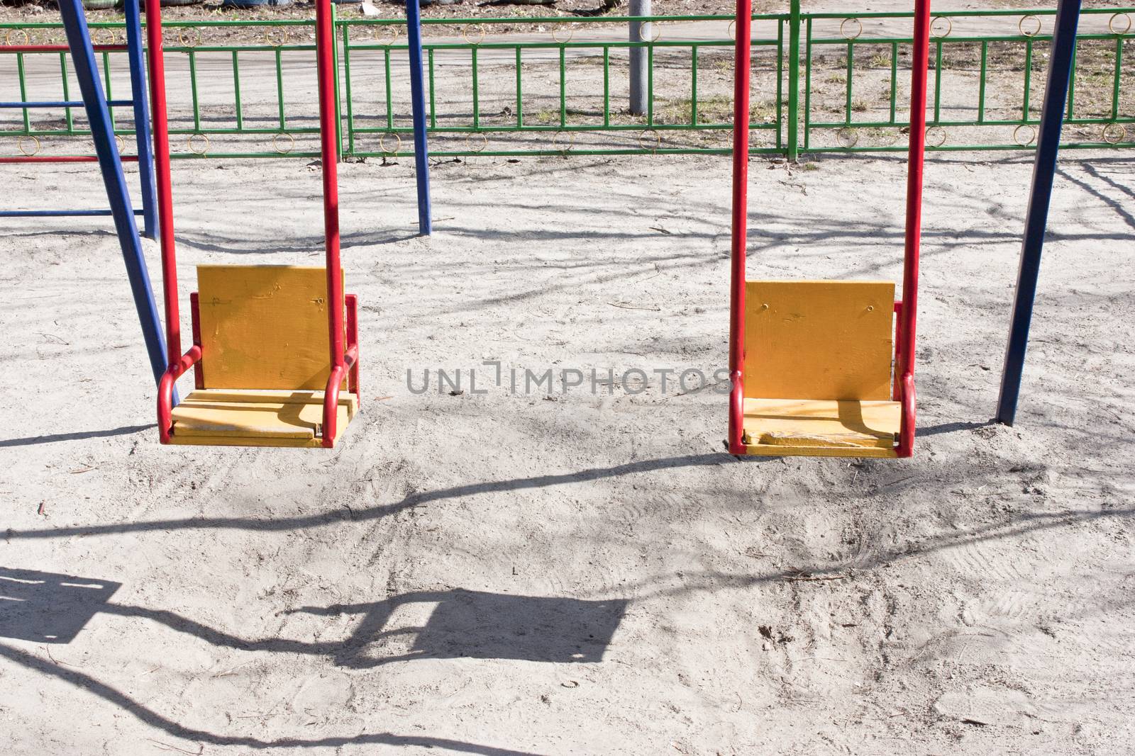 Children swing in the park. Colorful swing, photo