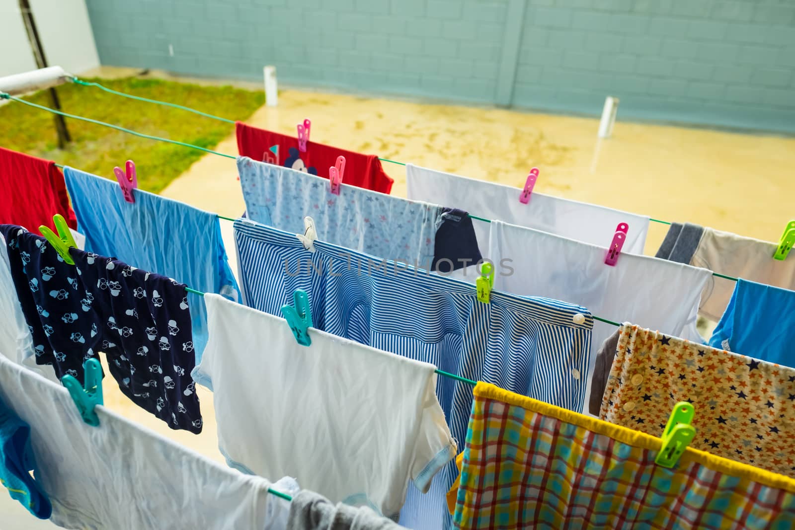 Hanging wet clothes at rainy monsoon season in South East Asia