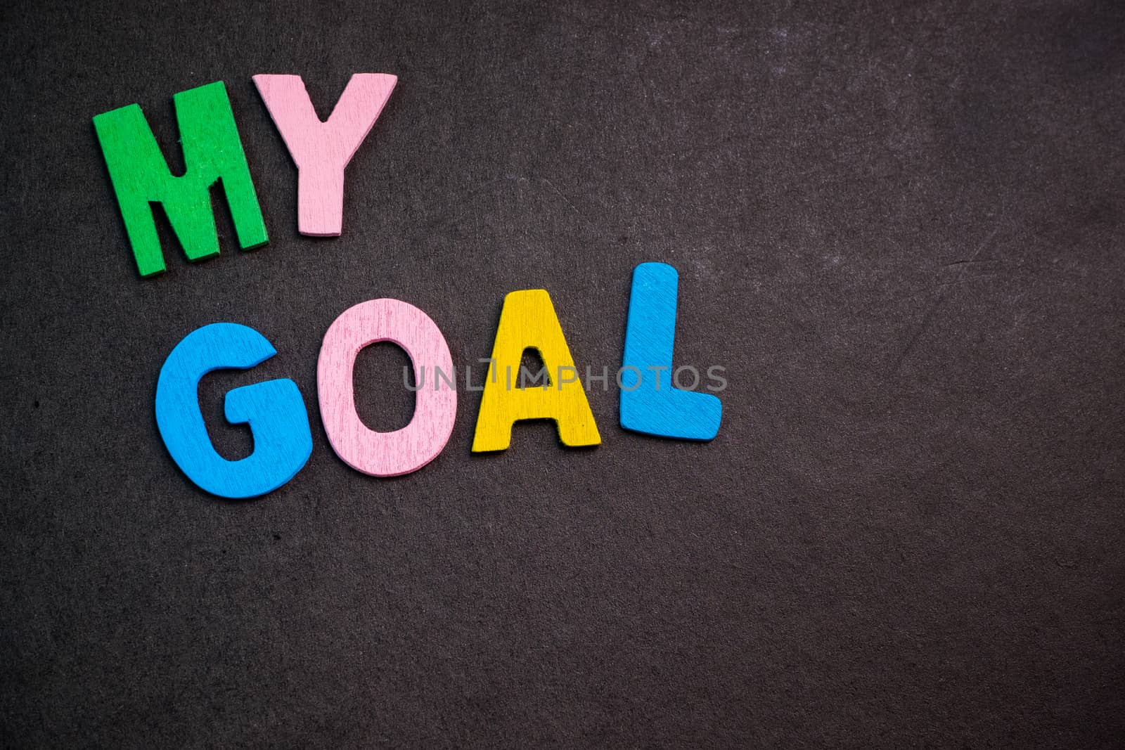 Colorful wooden letters forming the phrase "my goal"