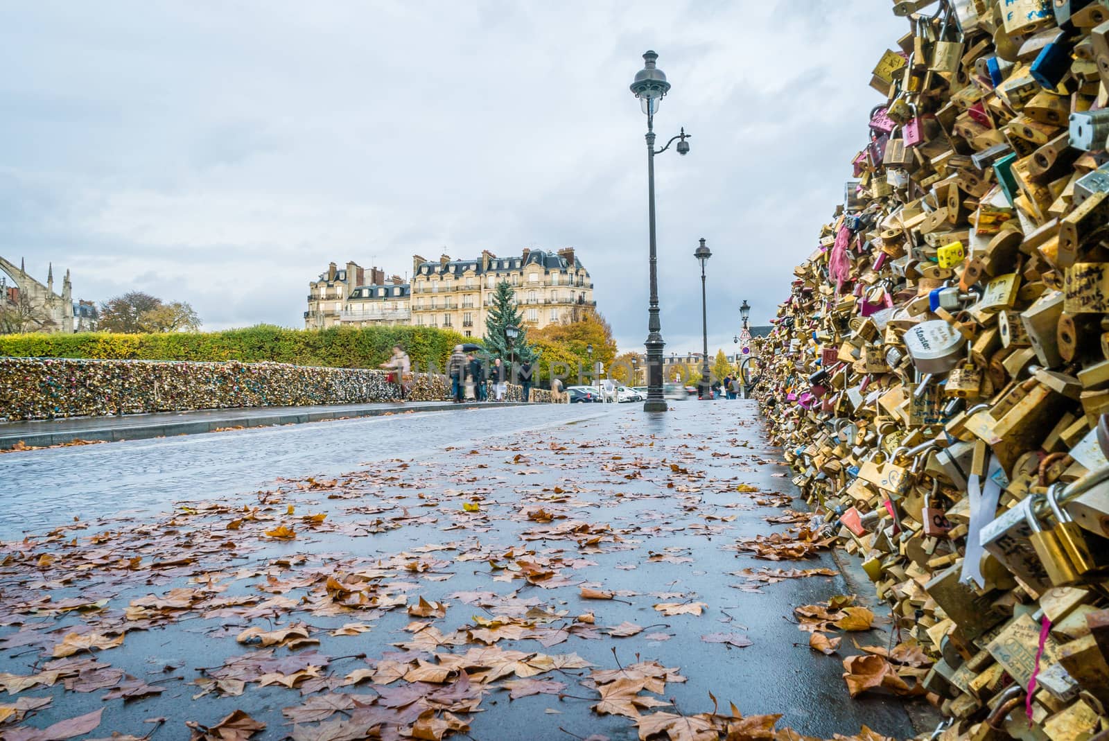 Love locks on Pont des Arts in Paris in autumn