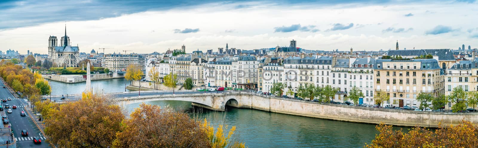 Panorama of Notre-dame-de-Paris and Seine river in Paris in autumn