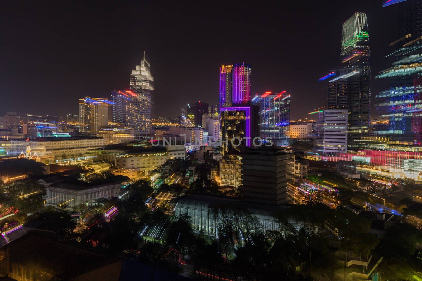 Saigon, Ho Chi Minh, Vietnam, Asia, 29 January 2018- Zooming skyline view of the capital city Ho Chi Minh at night with the colourful city lights ablaze.