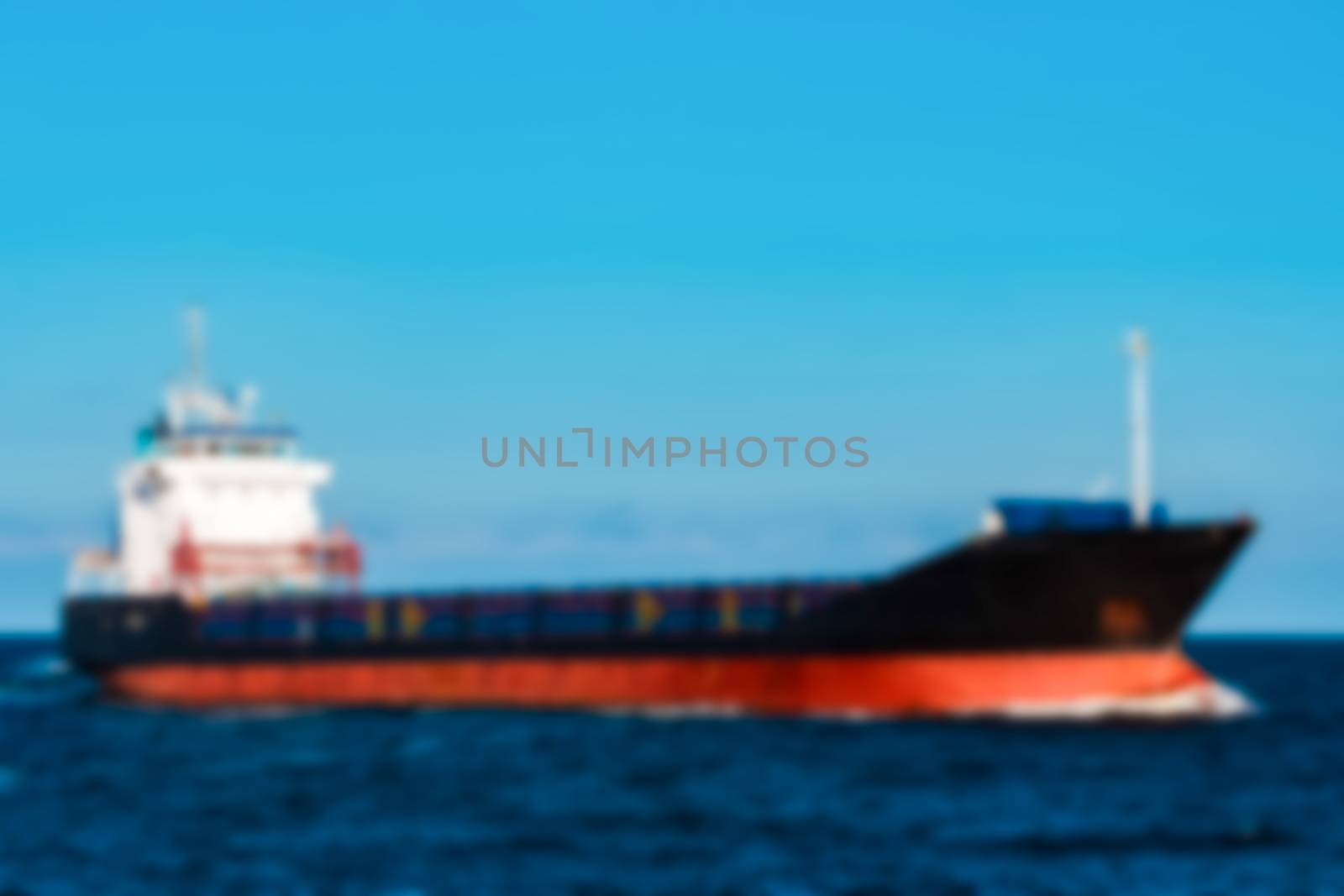 Cargo ship - blurred image by sengnsp