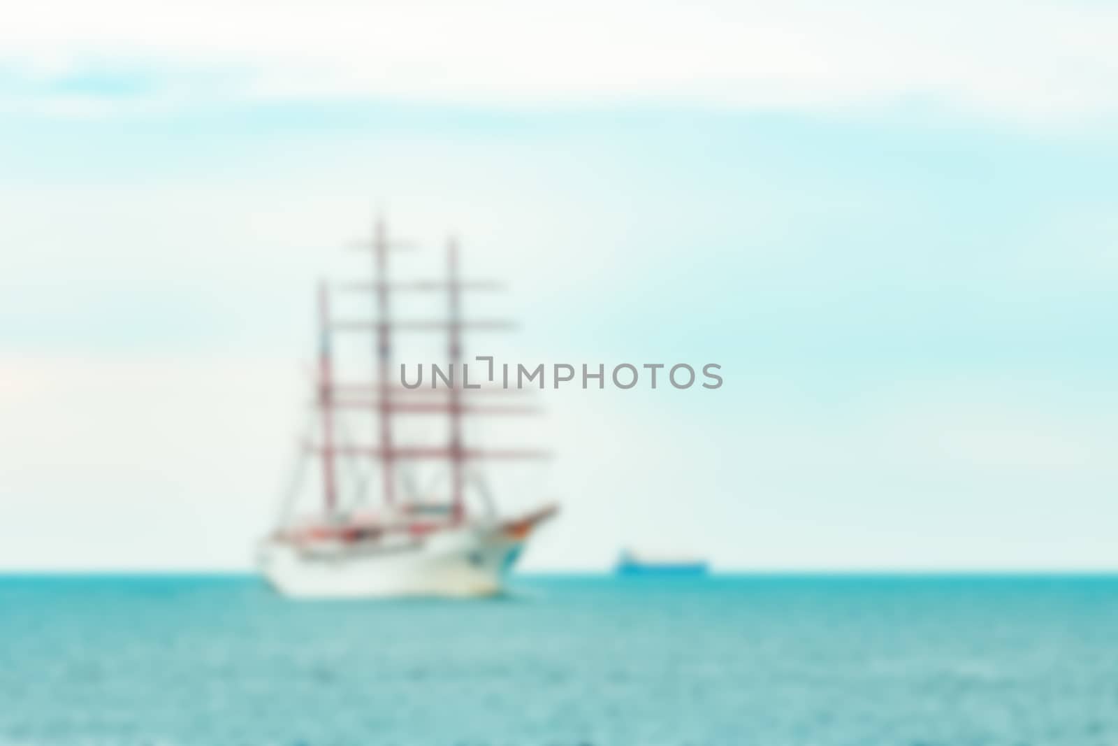 White sailing ship - soft lens bokeh image. Defocused background