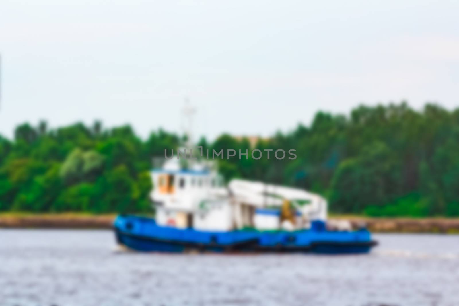 Tug ship - soft lens bokeh image. Defocused background