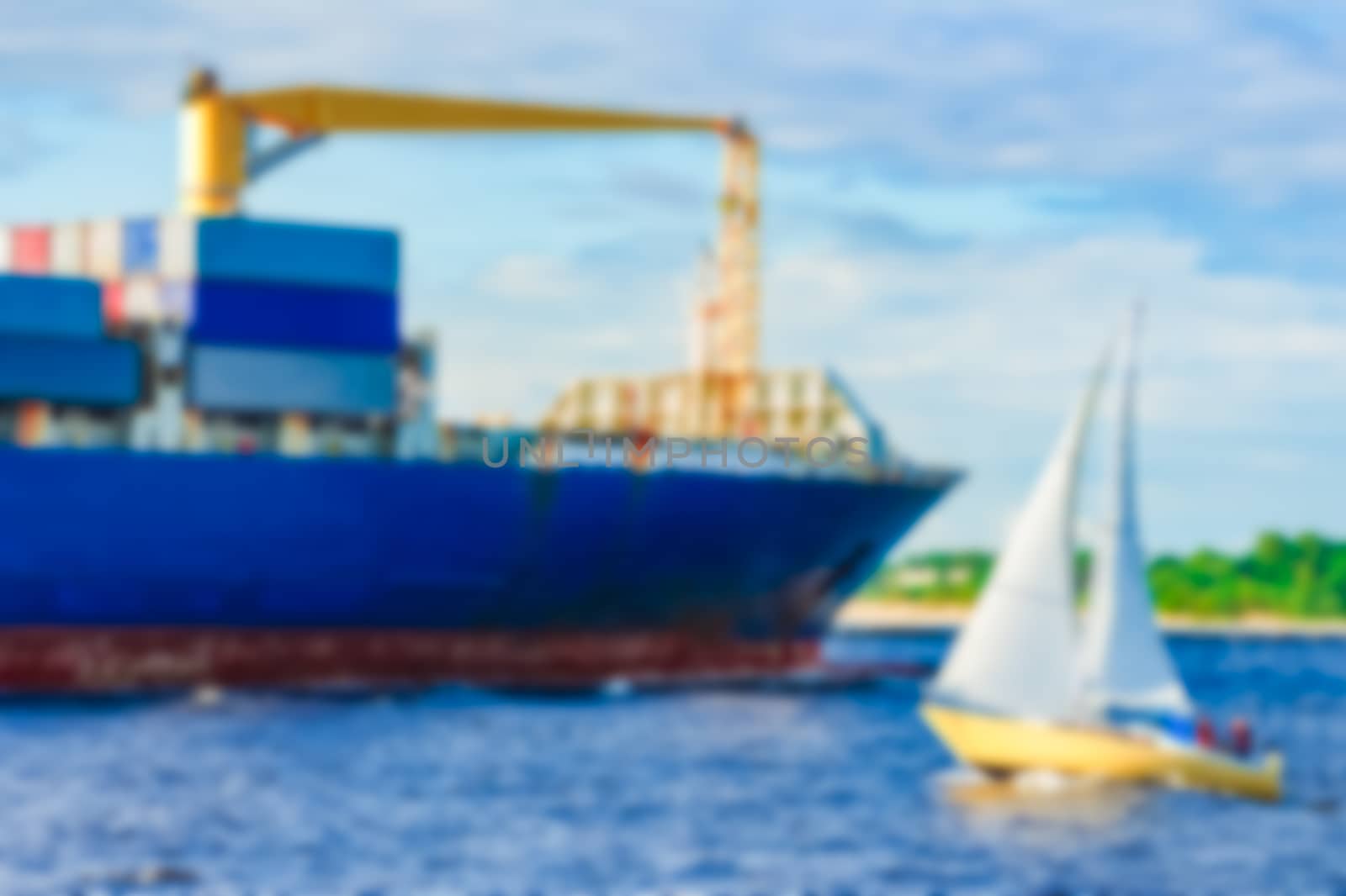 Blue cargo ship - soft lens bokeh image. Defocused background