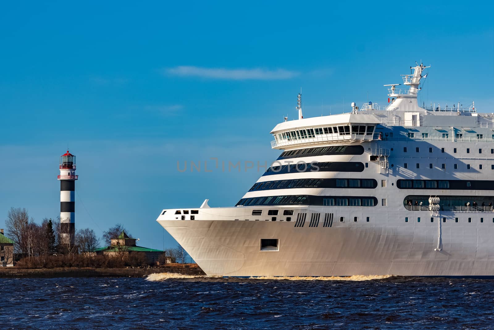 White cruise liner sailing on a clear day