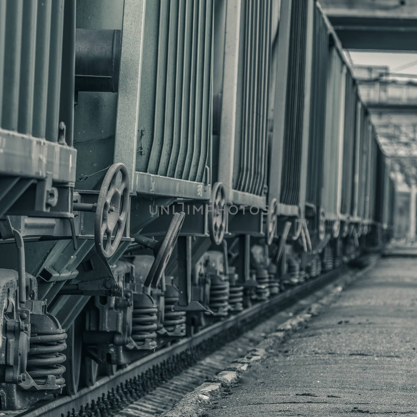 Green cargo wagons. Freight train in action