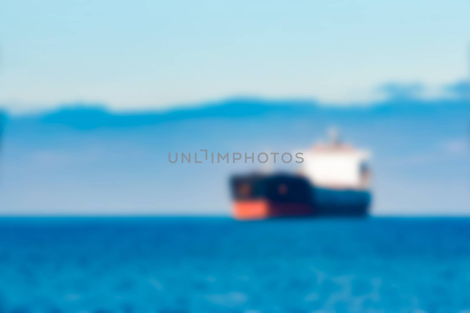 Cargo ship - blurred image by sengnsp