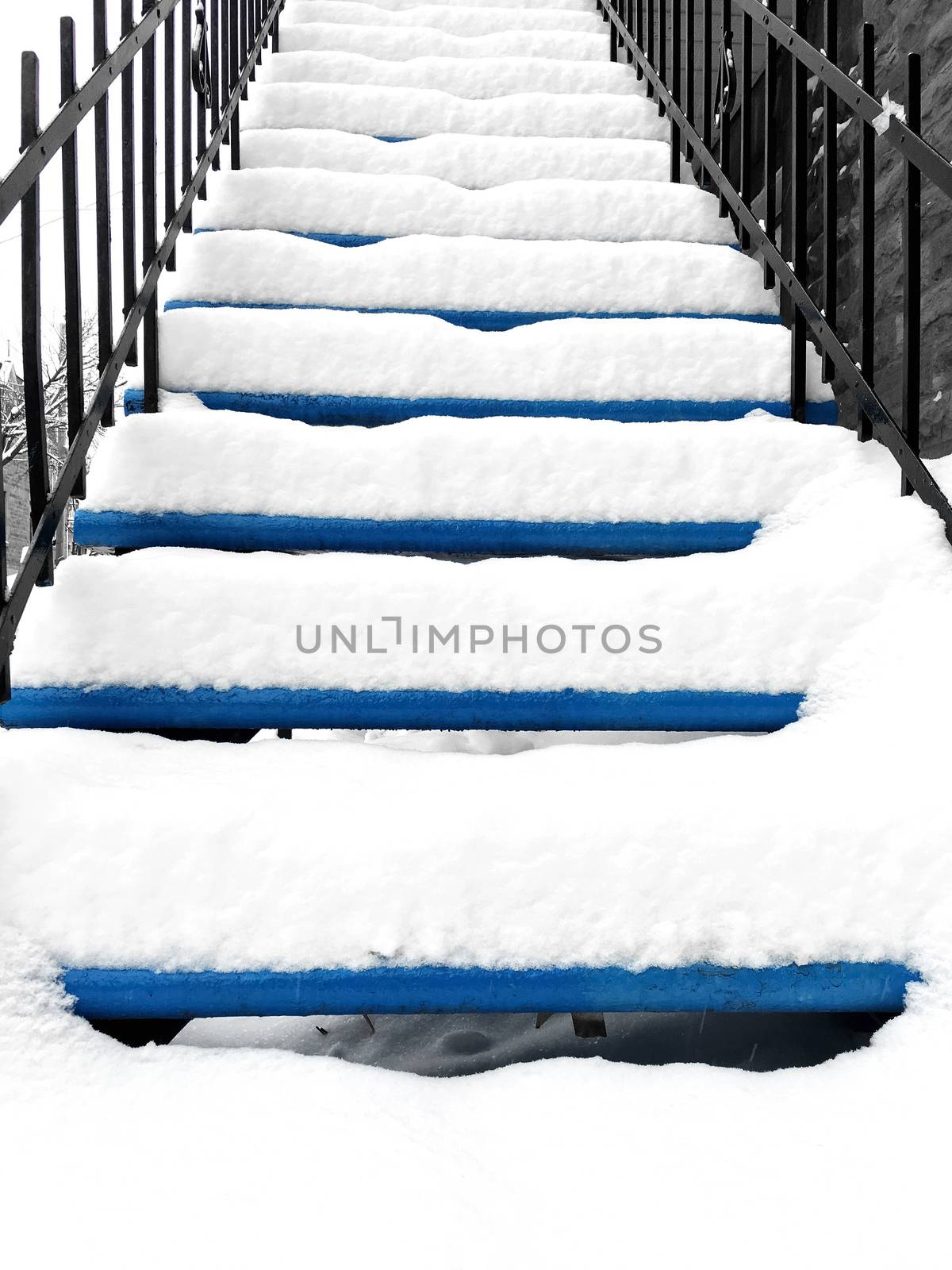 Townhouse staircase after snowstorm by anikasalsera