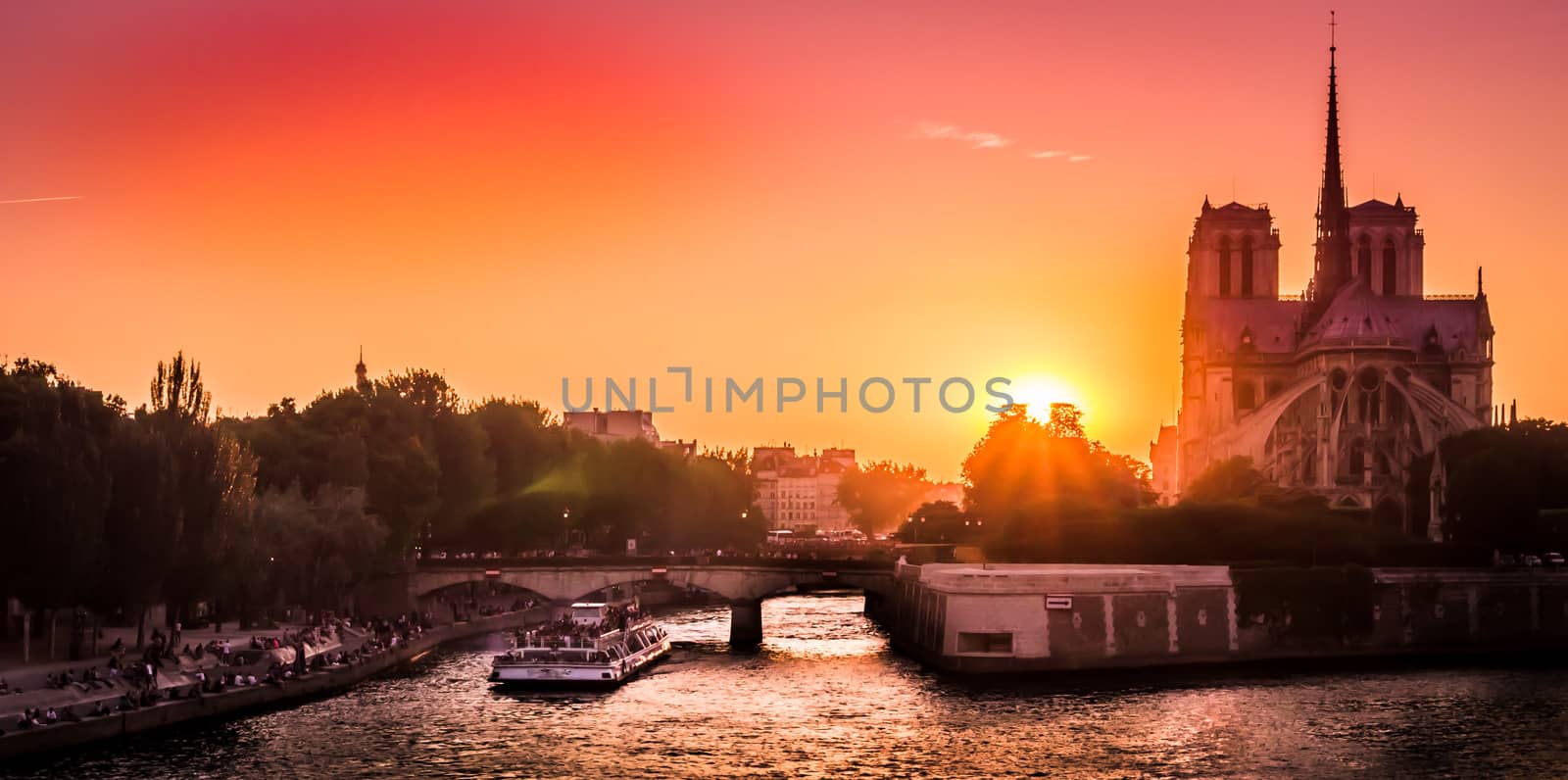 Red sunset over Paris and Notre Dame de Paris in the summer