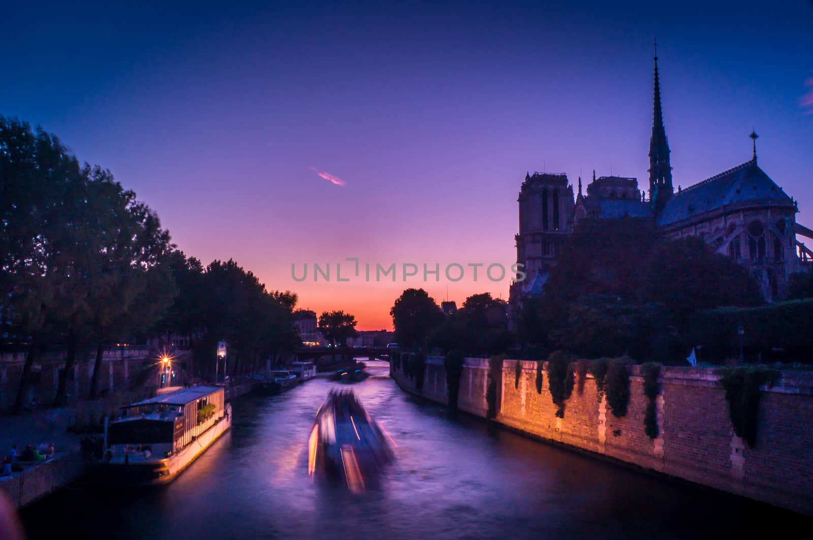 Purple sunset over Paris and Notre Dame de Paris by bignoub