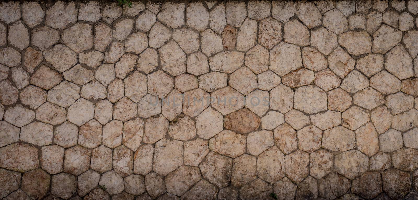 Design patterns on the wall tile at malaga, Spain, Europe on a bright sunny day