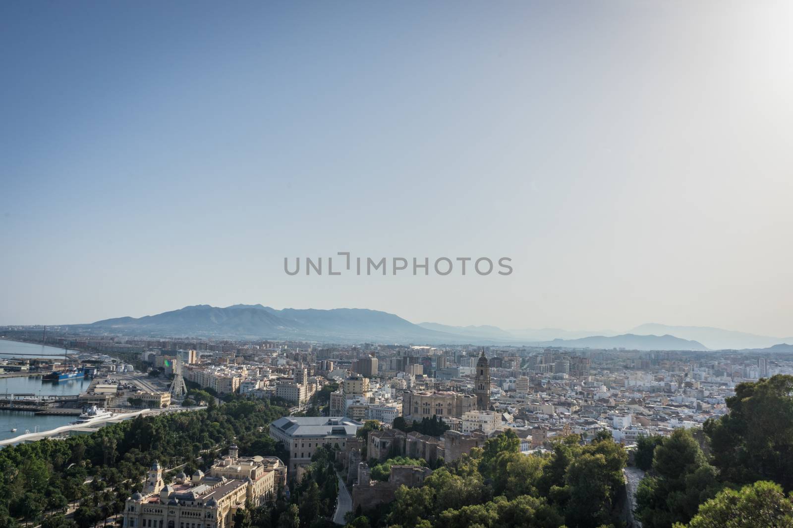 Cityscape aerial view of Malaga, Spain. The Cathedral of Malaga is a Renaissance church in the city of Malaga in Andalusia in southern Spain during sunset