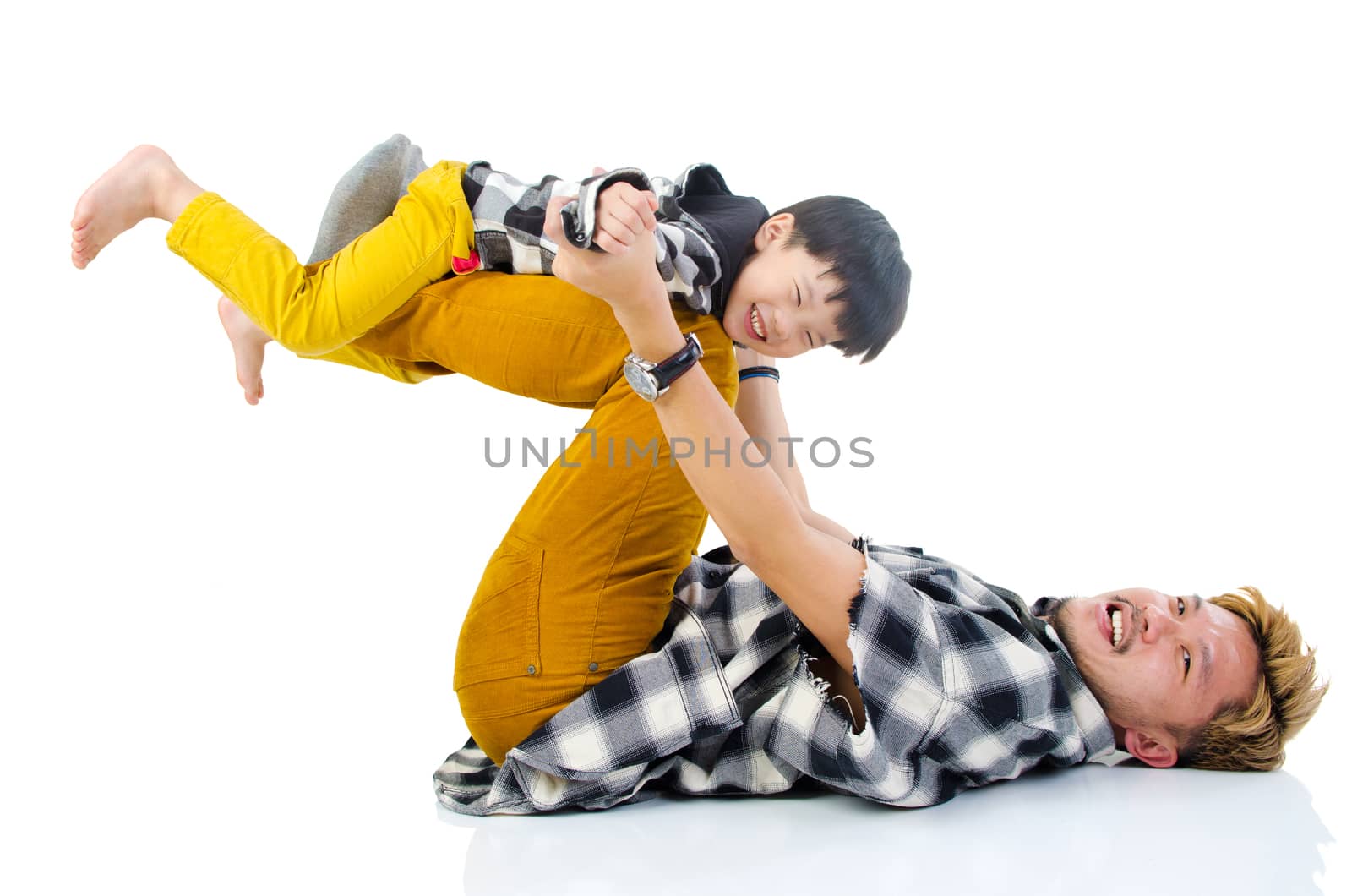 Happy Asian father playing with little boy
