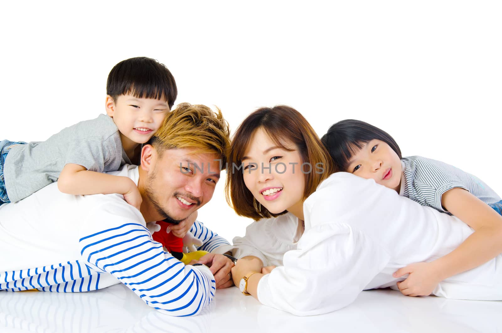 Indoor portrait of a beautiful asian family