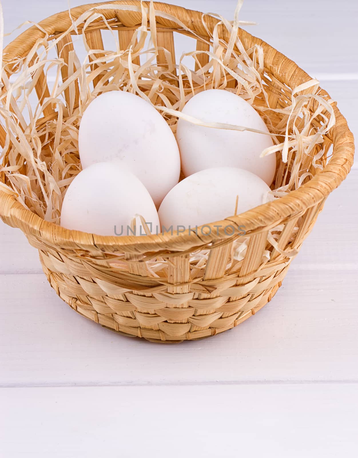 Eggs in basket by victosha