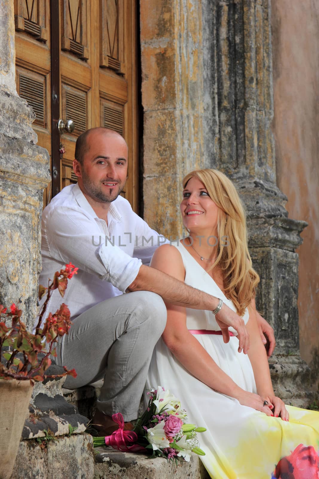 portrait of a young couple in a garden