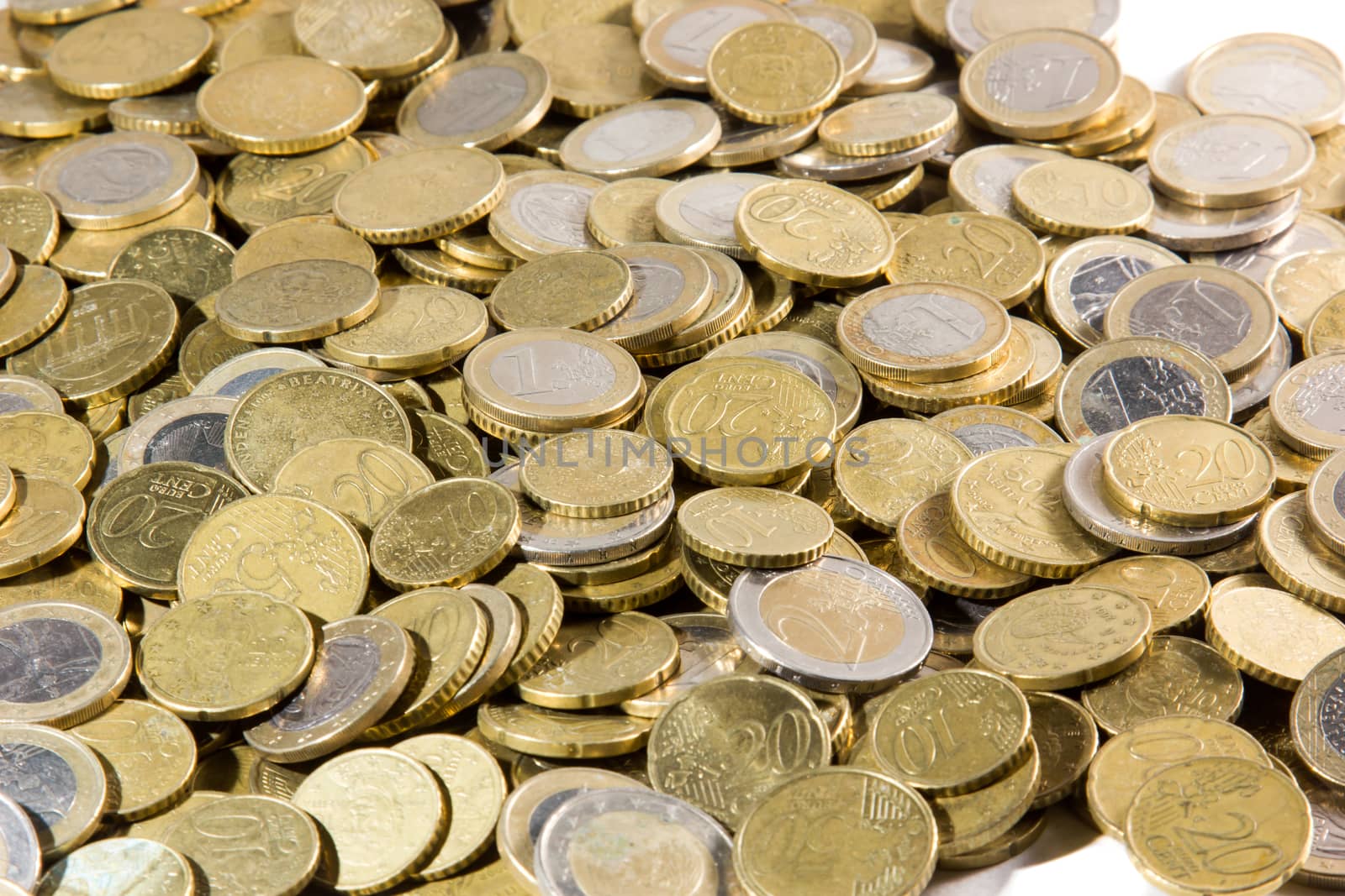 heap of euros coins isolated on a white background