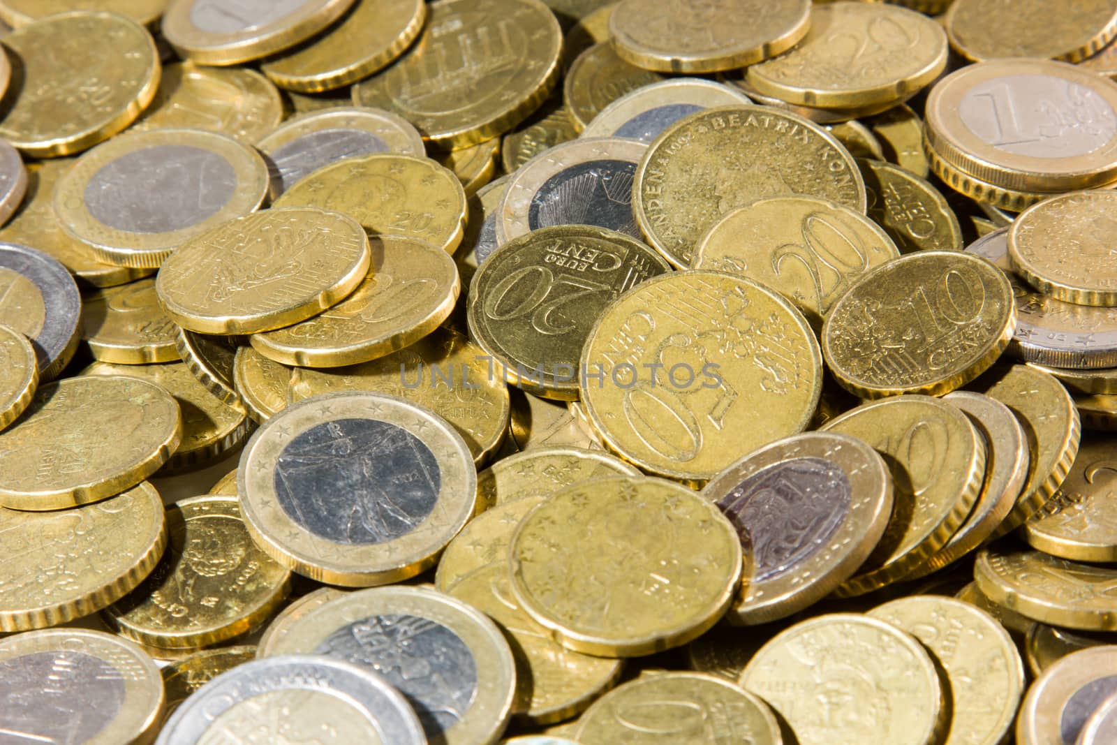 heap of euros coins isolated on a white background